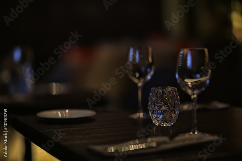 glass white wine restaurant interior, abstract evening dinner with alcohol at the bar