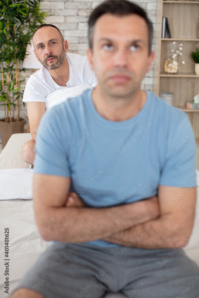 portrait of sad man not talking to partner portrait of sad man not talking to partner