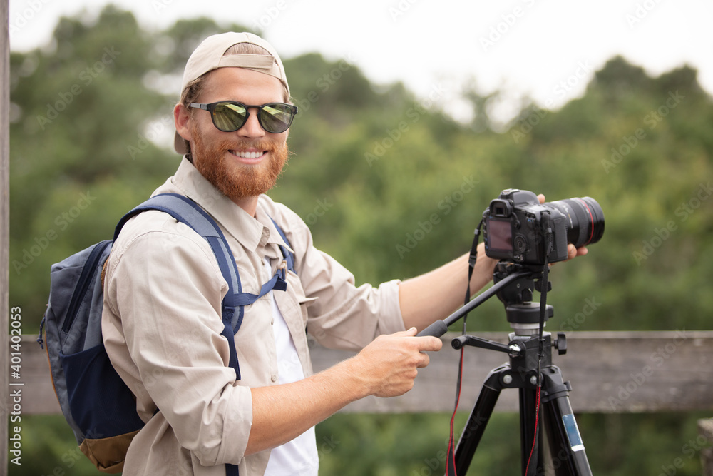 a videographer is documenting nature