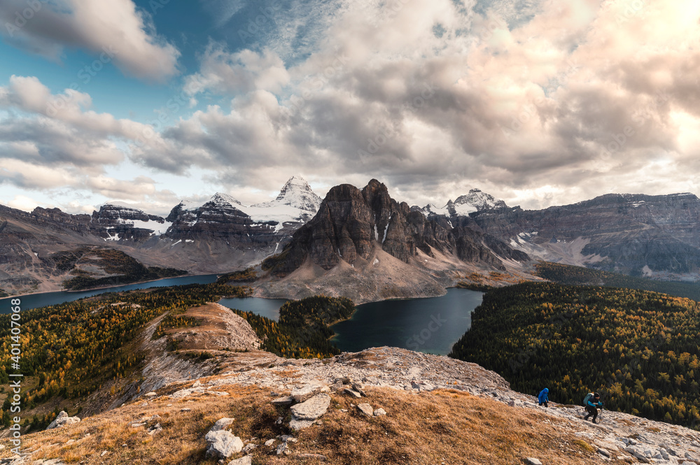 Mount Assiniboine with lake in autumn forest on Nublet peak at provincial park