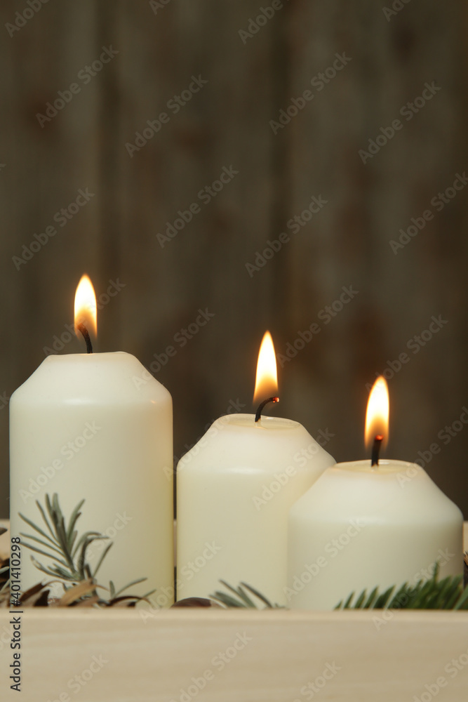 Wooden box christmas centerpiece. Simple and small home decoration with candles in wooden box.
Wooden box christmas centerpiece. Simple and small home decoration with candles in wooden box.