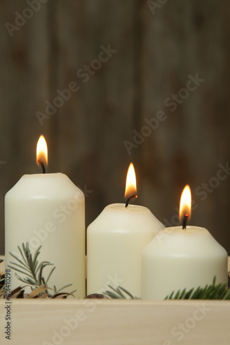 Wooden box christmas centerpiece. Simple and small home decoration with candles in wooden box. 