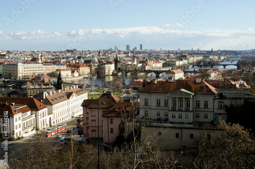 panoramic view of Prague in a winter sunny day where light makes buildings seem magical on the golden hour