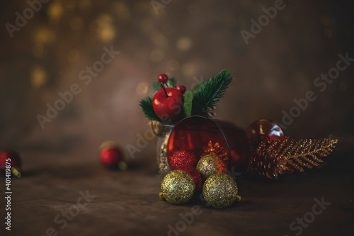 new year and christmas background with different glasses and toys for the christmas tree on a dark background