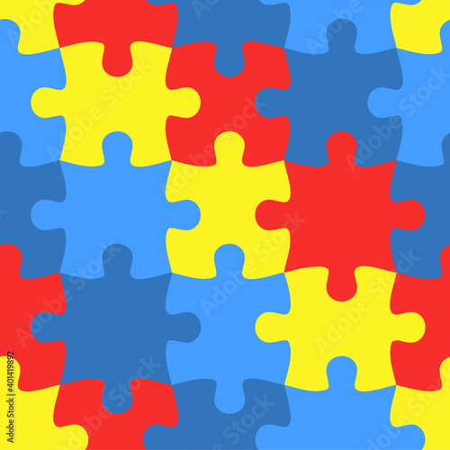 Colorful jigsaw. Seamless puzzle pattern. Autism background. World autism awareness day. Childish design template. Vector Illustration. EPS10. Design for fabric, wallpaper, textile and decor.