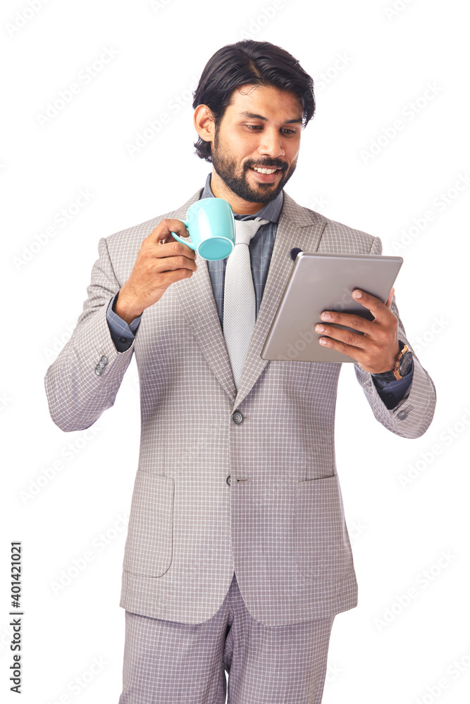 Handsome happy young businessman with tablet and cup of coffee on white. Handsome happy young businessman with tablet and cup of coffee on white.
