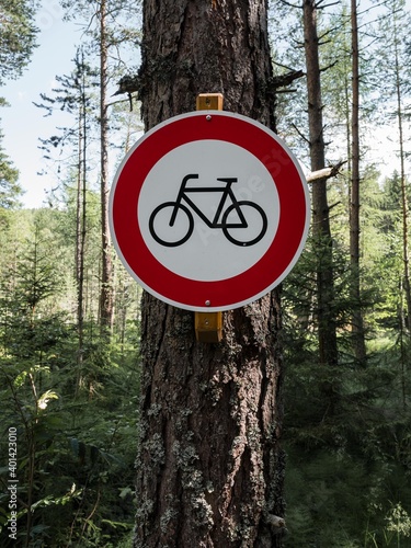 Bicycle prohibition sign in a forest