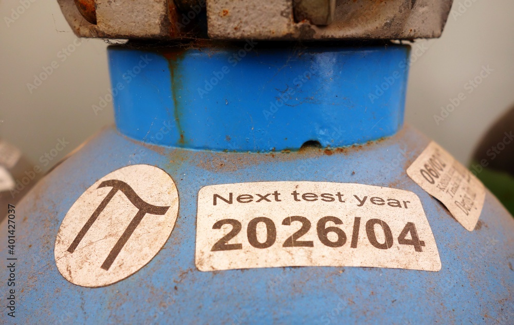 Blue gas cylinders with expiration date label Stock Photo Adobe Stock