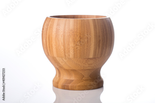 Wooden mortar on white background