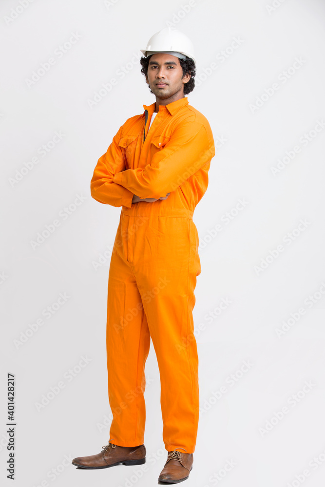 Indian municipal young worker with crossed hands on white background. Indian municipal young worker with crossed hands on white background.