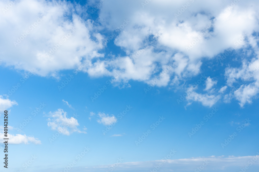 Blue sky. Stratocumulus clouds on blue sky background. Blue sky. Stratocumulus clouds on blue sky background.
