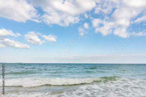 Sea waves and blue sky on sunny day background. copy space © Achira22