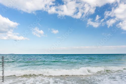 Sea waves and blue sky on sunny day background. copy space
