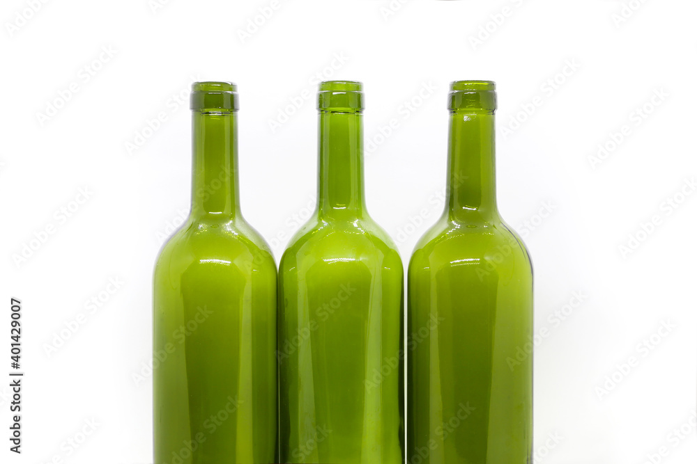 Three green empty wine bottles on a white background Three green empty wine bottles on a white background