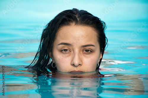 Portrait of a woman in a swimming pool