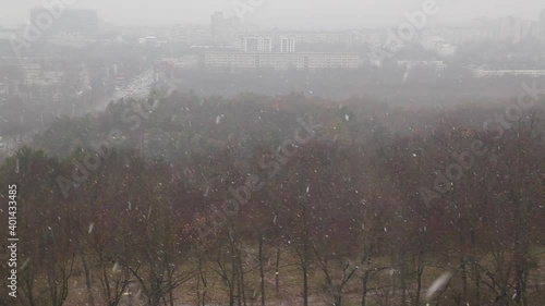 Top view of first snowfall in a city park 