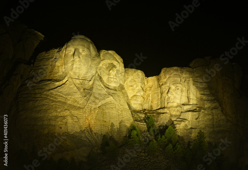 Mount Rushmore illuminated at night