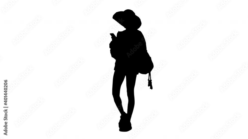 Smiling young african american woman in a straw hat texting on her phone, Alpha Channel Smiling young african american woman in a straw hat texting on her phone, Alpha Channel