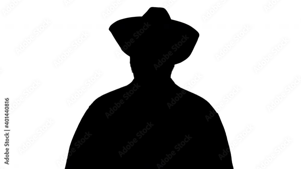 Silhouette Farmer taking off medical mask and taking a deep breath. Coronovirus pandemic is over. Silhouette Farmer taking off medical mask and taking a deep breath. Coronovirus pandemic is over.