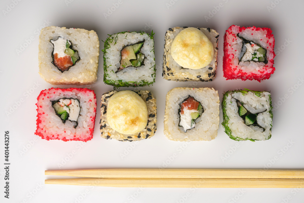 four pieces of sushi on a white background. the view from the top four pieces of sushi on a white background. the view from the top