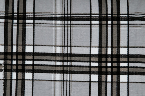 Horizontal and vertical stripe fabric effect texture sample old and retro texture brown cotton fabric texture cloth material.