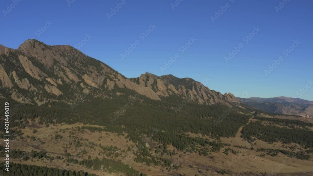 aerial pan of boulder flatiron mountains in colorado aerial pan of boulder flatiron mountains in colorado