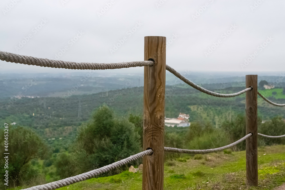 Fototapeta premium Rustic style fence made of posts and ropes