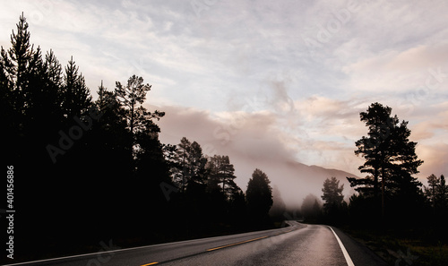 sunset in the mountains and shader road