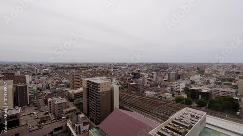 Kanazawa, Japan Cityscape Time-lapse Rooftop Lookout on A Cloudy Day photo