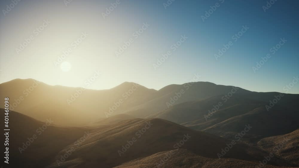 hills with rocks at sunset hills with rocks at sunset