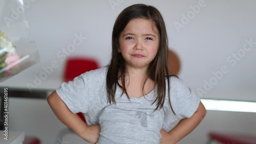 Upset angry little girl child negative emotional reaction