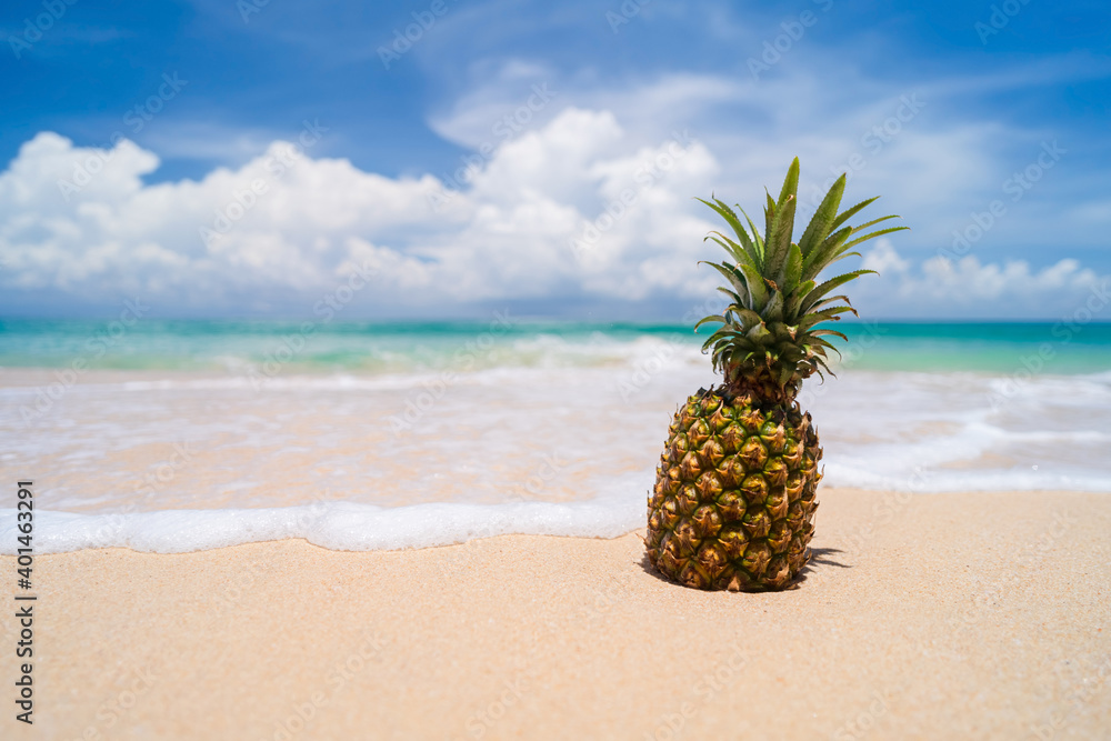 Pineapple on tropical beach background. Summer vacation and healthy food concept. Pineapple on tropical beach background. Summer vacation and healthy food concept.