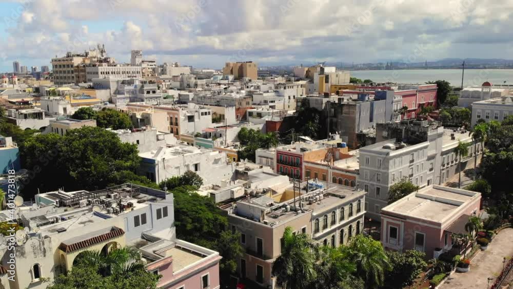 Drone shot on a cloudy day with blue skys over Old San Juan Puerto Rico with colorful building Drone shot on a cloudy day with blue skys over Old San Juan Puerto Rico with colorful building