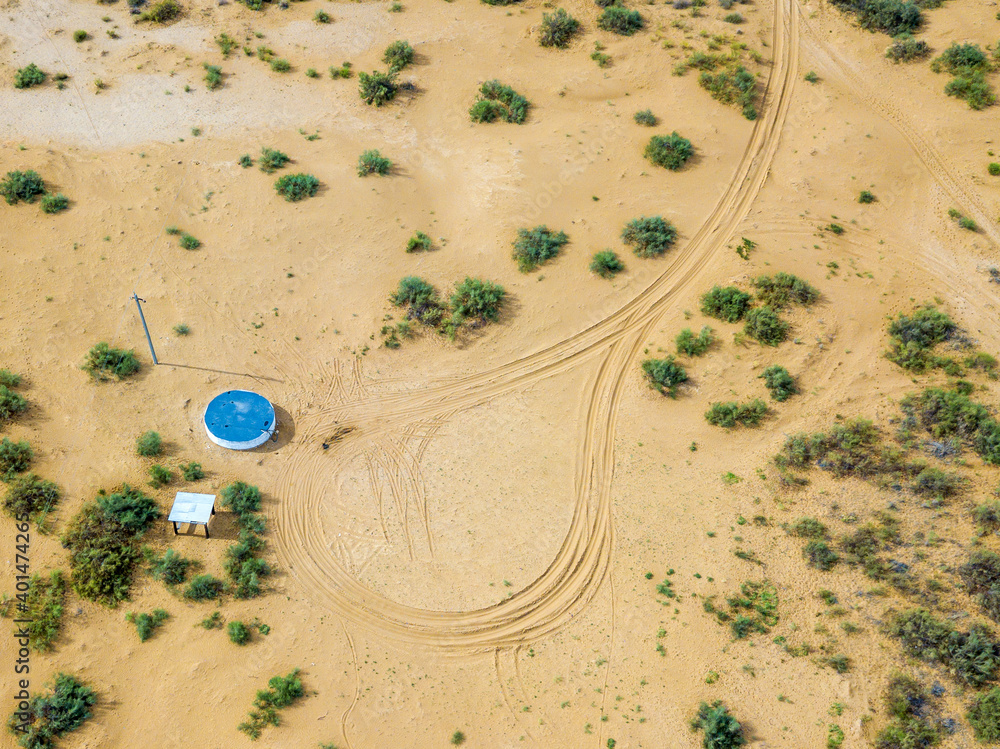Obraz premium Water well in the desert or steppe. Place to turn the water delivery vehicle