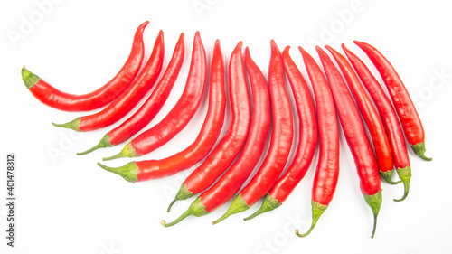 Red hot chili peppers on a white background. food figures. Vitamin vegetable food