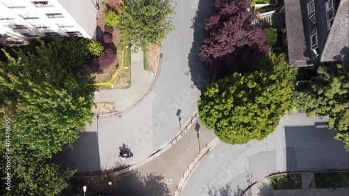 aerial birds eye view fly over Downtown Vancouver Gay Village neighborhood West End with low rise residential apartment buildings connecting to respit town homes attached King George style design 3-3 photo