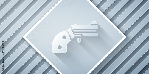 Paper cut Small gun revolver icon isolated on grey background. Pocket pistol for self-defense. Ladies revolver. Spy Weapon. Paper art style. Vector.