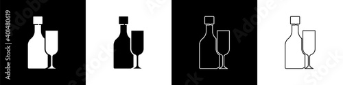 Set Wine bottle with glass icon isolated on black and white background. Vector.