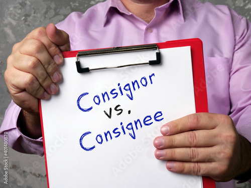 Business concept meaning Consignor vs. Consignee with phrase on the piece of paper.