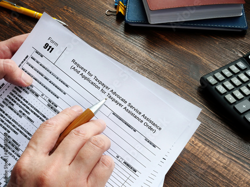 Fotografi Conceptual photo about Form 911 Request for Taxpayer Advocate Service Assistance (And Application for Taxpayer Assistance Order) with handwritten phrase