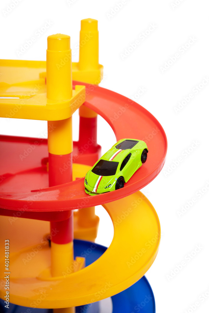 Game for small boys car parking on a white background . Game for boys . Plastic games. Off-street Parking.