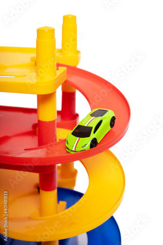 Game for small boys car parking on a white background . Game for boys . Plastic games. Off-street Parking.