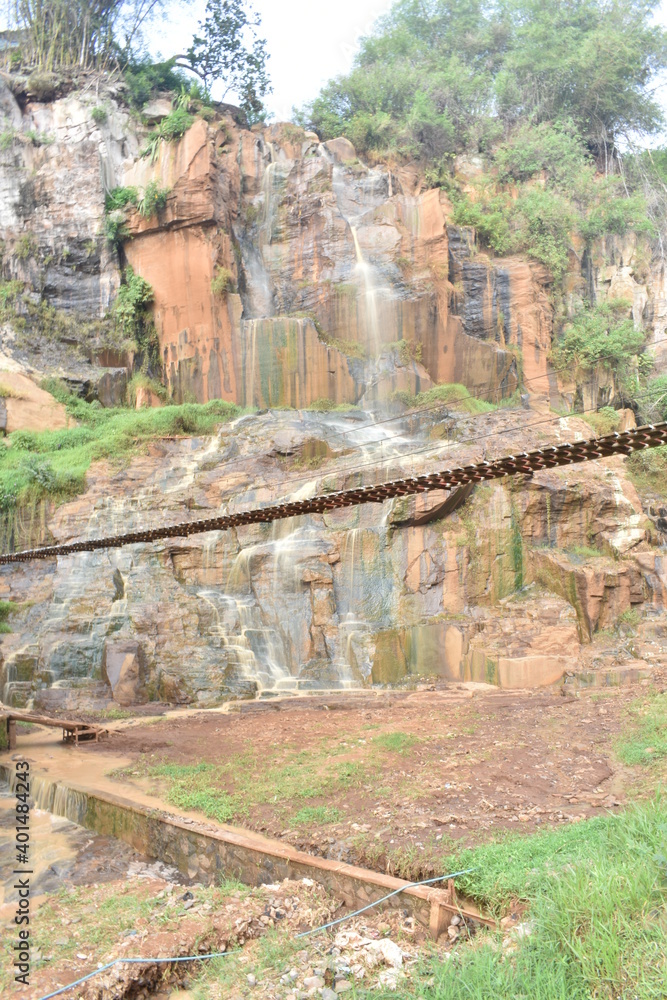 bridge  with waterfall in the backgorund