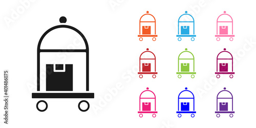 Black Hotel luggage cart with suitcase icon isolated on white background. Traveling baggage sign. Travel luggage icon. Set icons colorful. Vector.