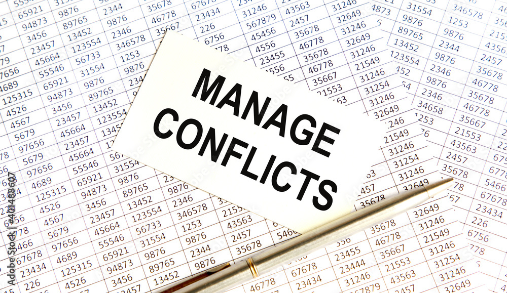 On the CARD, THE MANAGE CONFLICTS, a pen, the background are reports. On the CARD, THE MANAGE CONFLICTS, a pen, the background are reports.