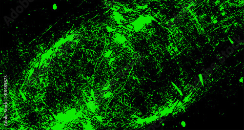 Grunge bright neon background. Green scuffs on a black wall.