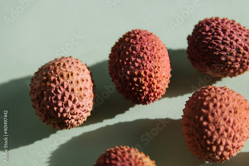 Lychee exotic fruits, organic, fresh. Classic grey color background, top view.