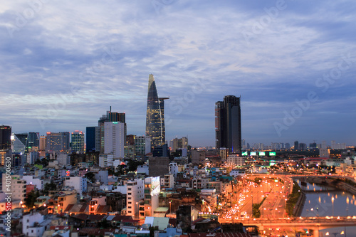 Beautiful night city  cityscape of Ho Chi Minh city  Vietnam  modern futuristic architecture nighttime illumination  luxury traveling concept.