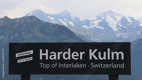 Top of Interlaken, Harder Kulm sign at 1323 m height, with mountains background, Switzerland. 
