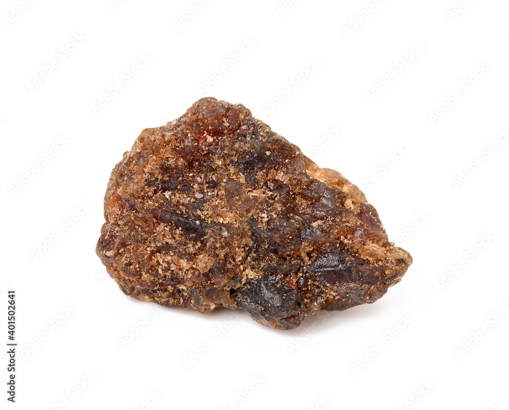 lump of brown cane sugar isolated on white background lump of brown cane sugar isolated on white background